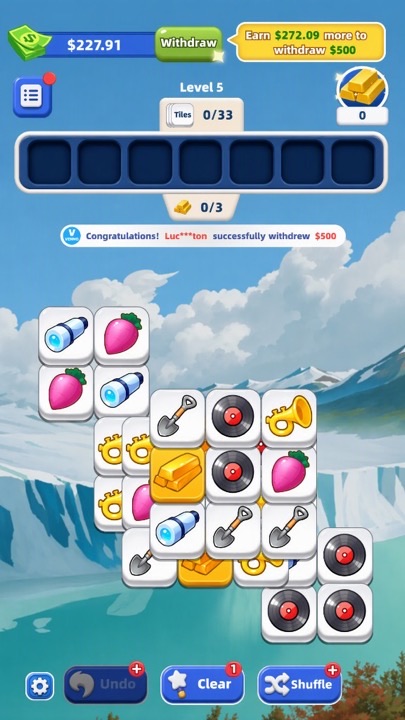 Prize Tiles gameplay with tray and mountain scenery